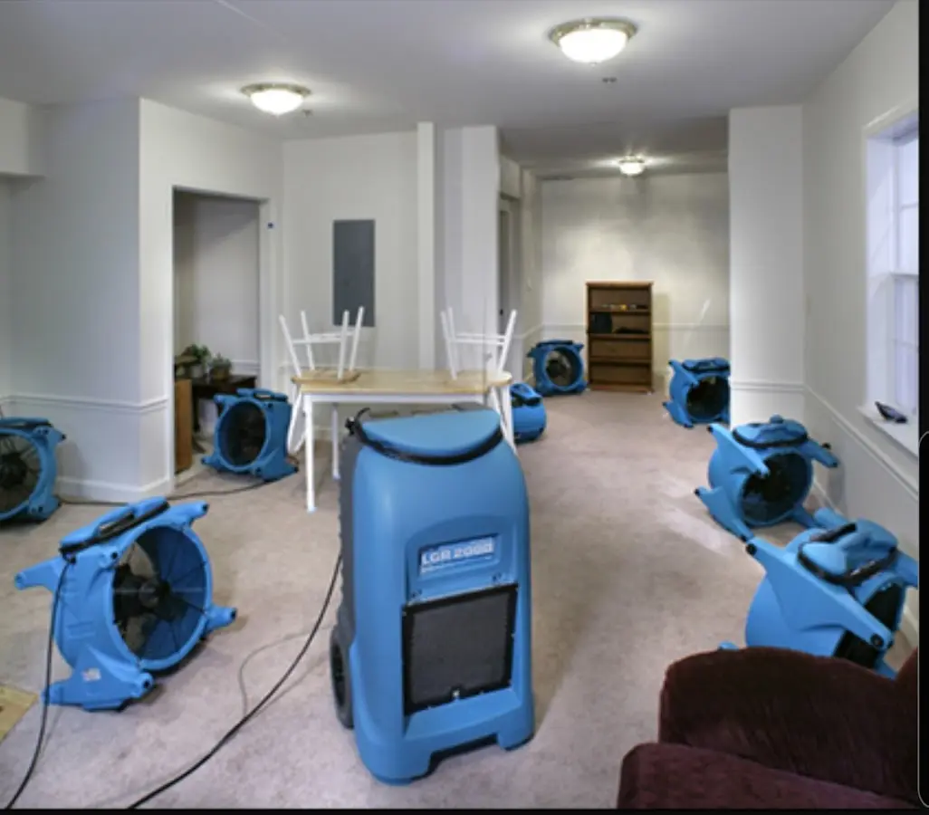 Air movers and dehumidifier setup for Water Damage Restoration in Coal